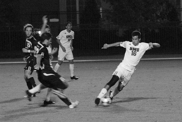 Senior Richard Olivia aims a shot at his opponents goal in a game at Westcott Field. CASEY LEE/The Daily Campus