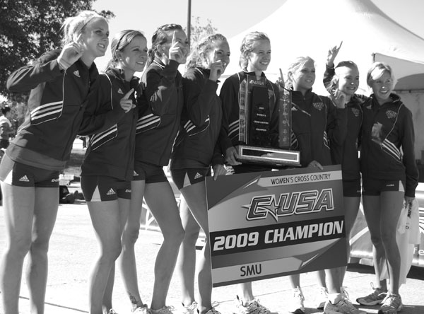 The SMU cross country team repeats as Conference USA champions after taking first at the conference tournament in Houston last weekend. Head coach Cathy Casey won C-USA Head Coach of the Year award for the second time. Photo courtesy SMU Athletics