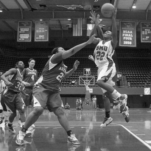 Freshman guard Alisha Filmore drives to the basket against Arkansas Wednesady night.