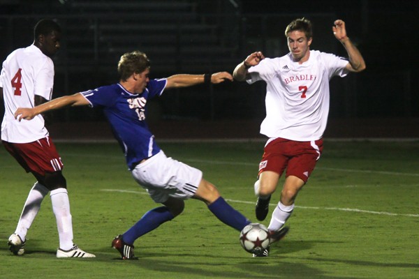 Transfer Brandon Pfluger, defender, steals the ball from a Bradley player on September 18th. SMU won the game at Wescott Field 2-0. CASEY LEE/The Daily Campus