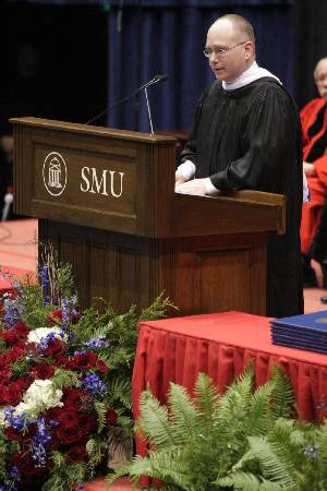 Alan C. Lowe, director of the Bush Presidential Library, speaks to students during the 2009 December graduation ceremony.