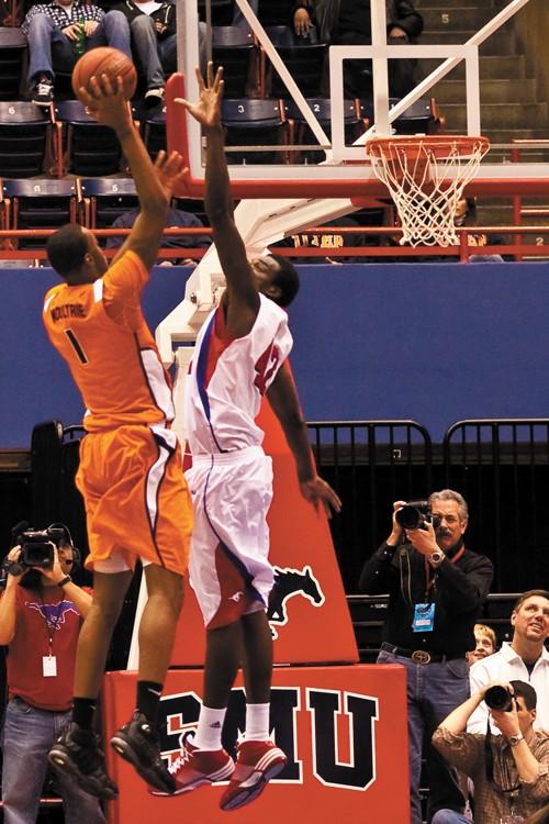 SMU center Papa Dia attempts to block a shot from an opposing UTEP player Feb 10 at Moody Coliseum.