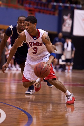 SMU guard Derek Williams on offense against Rice last Wednesday at Moody Coliseum. SMU won the game 67-57.