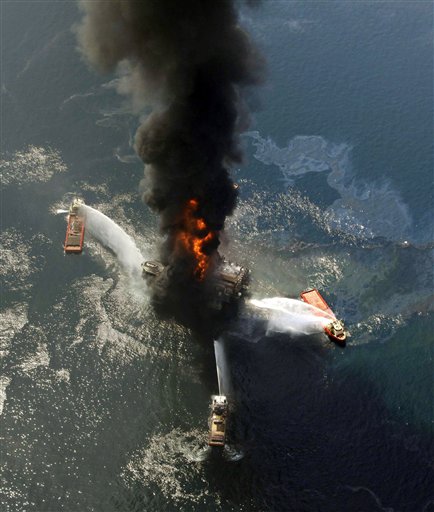 This April 21, 2010 file photo shows the Deepwater Horizon oil rig burning after an explosion in the Gulf of Mexico, off the southeast tip of Louisiana. Retired Coast Guard Adm. Thad Allen, the federal governments point man on the disaster, said Sunday, Sept. 19, 2010, BPs well is effectively dead. A permanent cement plug sealed BPs well nearly 2.5 miles below the sea floor in the Gulf of Mexico, five agonizing months after an explosion sank a drilling rig and led to the worst offshore oil 