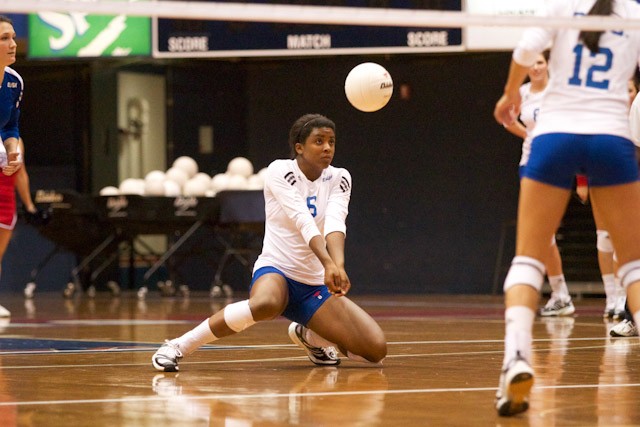 SMU outside hitter Dana Powell returns a serve from Tulsa libero Jessica Adams during the game Wednesday evening inside Moody Coliseum. SMU lost the game 3-2.