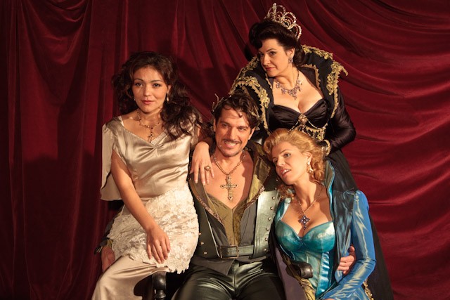  Ailyn Perez, left, playing the role of Zerlina, Paulo Szot as Don Giovanni, Claire Rutter, standing, as the Queen Alvira and Georgia Jarman as Donna Anna, star in The Dallas Opera’s production of “Don Giovanni,” premiering Oct. 22 at the Winspear Opera House.