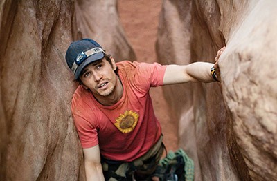 James Franco stars as a mountain climber who becomes trapped under a boulder in acclaimed director Danny Boyle’s latest movie, “127 Hours.”