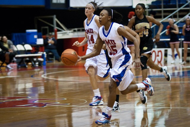 SMU guard Raquel Christian brings the ball up the court against The  University of Arkansas at Pine Bluff Wednesday evening inside Moody Coliseum. SMU won the game 80-48. 