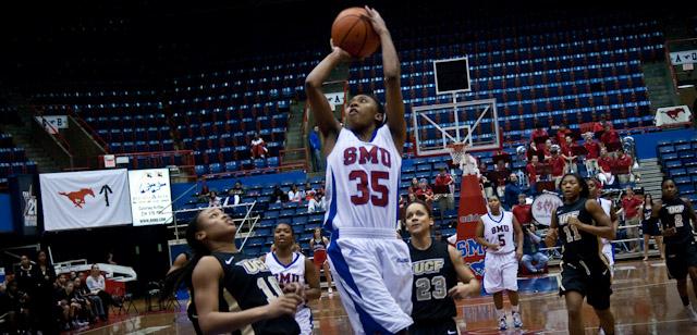 SMU+guard+Raquel+Christian+goes+for+a+layup+during+play+against+UCF+Sunday+afternoon+at+Moody+Coliseum.+%28REBECCA+HANNA%2FThe+Daily+Campus%29
