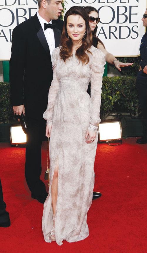 Leighton Meester arrives at the Golden Globe Awards Sunday, Jan. 16, in Beverly Hills, Calif. 