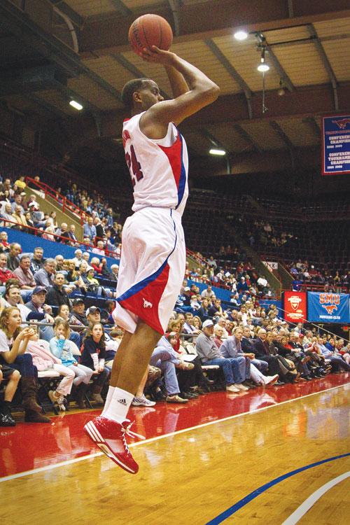 SMU forward Robert Nyakuni goes for a three point shot against the University of Southern Mississippi last Saturday afternoon at Moody Coliseum. Nyakundi delivered a three point shot in the final second of Wednesday evening’s game against Tulsa University, delivering a 59-58 win for the Mustangs.