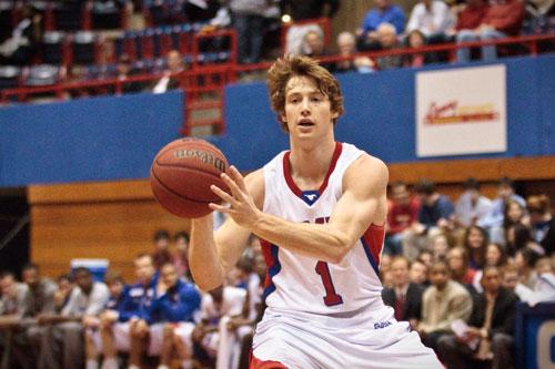 SMU transfer guard Collin Mangrum makes a pass during play at Moody Coliseum. 