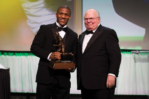 Oregon running back LaMichael James poses with the Doak Walker award  after receiving it from CBS sportscaster Verne Lundquist during the Doak Walker ceremony honoring the nation’s top running back, at the Hilton Anatole in Dallas, Friday evening. 