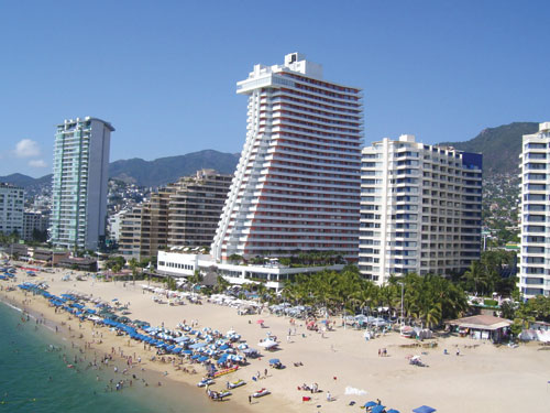 Beachgoers enjoy their spring break vacation in Acapulco, Mexico. 