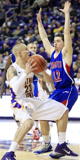 The University Northern Iowa’s Marc Sonnen, left, looks to shoot as SMU’s Jeremiah Samarrippas, right, defends in the second half of a College Insider.com tournament basketball game Monday in Cedar Falls, Iowa. SMU won 57-50. 