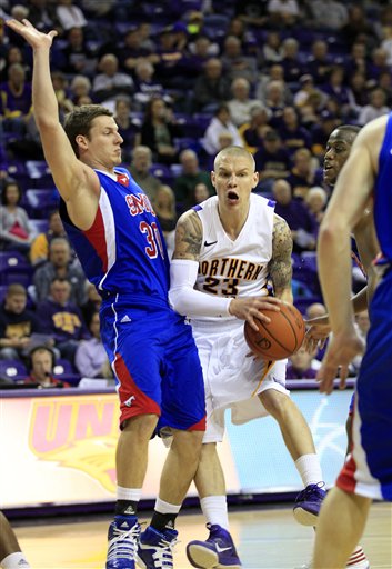 Northern Iowa’s Marc Sonnen, right, works to get past SMU’s Ryan Harp, left, in the first half of a College Insider.com tournament basketball game Monday, March 21, 2011, in Cedar Falls, Iowa. SMU won 57-50.