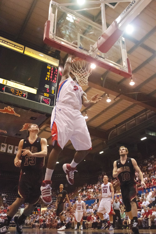 SMU guard Justin Haynes goes for a layup during play against Santa Clara Saturday evening during the CIT semifinals inside Moody Coliseum. SMU lost the contest 72-55.