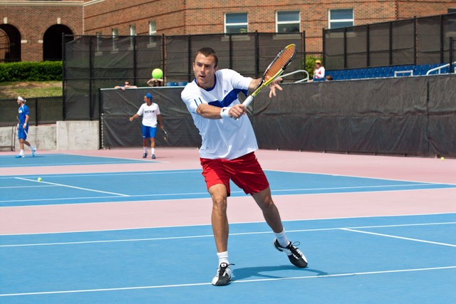 SMU senior Darron Walsh returns a volley during doubles play against the UC—Santa Barbara Sunday afternoon at Turpin tennis stadium.