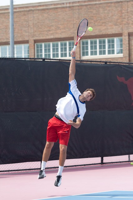SMU sophomore Gaston Cuadranti serves the ball during doubles play against UC Santa Barbara at Turpin Tennis Stadium.