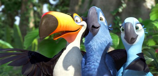 In this publicity image released by 20th Century Fox, animated characters, from left, Raphael, voiced by George Lopez, Blu, voiced by Jesse Eisenberg, and Jewel, voiced by Anne Hathaway, are shown in a scene from “Rio.”