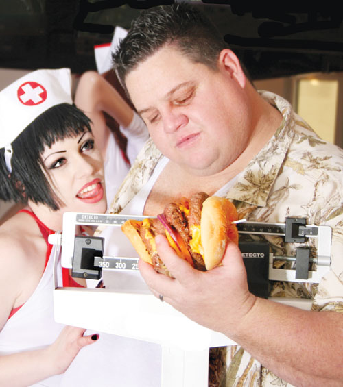Heart Attack Grill opens in Dallas’ West End on May 13 with the goal of using reverse psychology to raise awareness of rising obesity in America. 