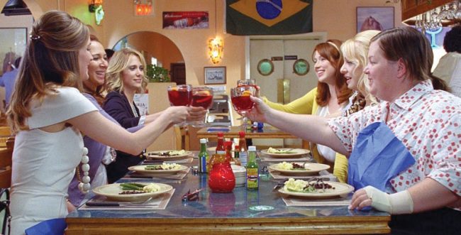 The cast of “Bridesmaids” in a scene from the upcoming film, which hits theaters May 13. The movie will be “Saturday Night Live’s” Kristen Wiig’s breakout film. 