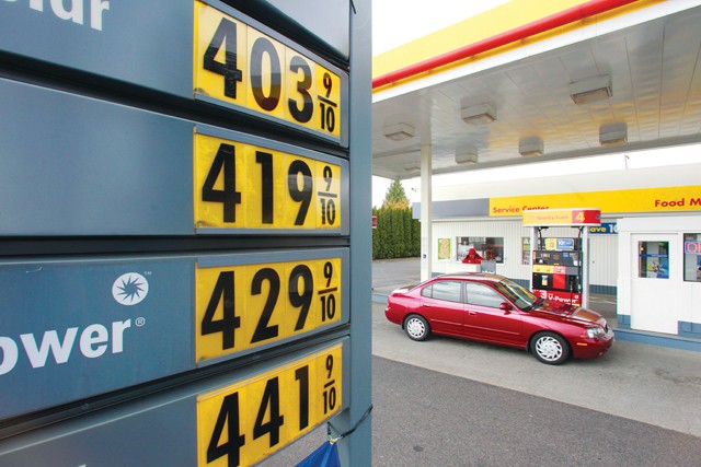 Gasoline pump prices are shown at a gas station Monday, in Portland, Ore.