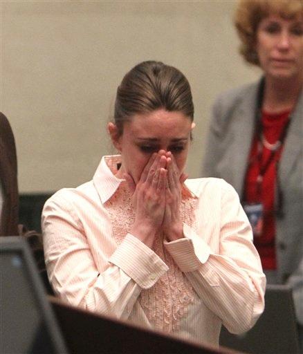 Casey Anthony reacts after the jury acquitted her of murdering her daughter, Caylee, during Anthonys murder trial at the Orange County Courthouse in Orlando, Fla., Tuesday, July 5, 2011. 