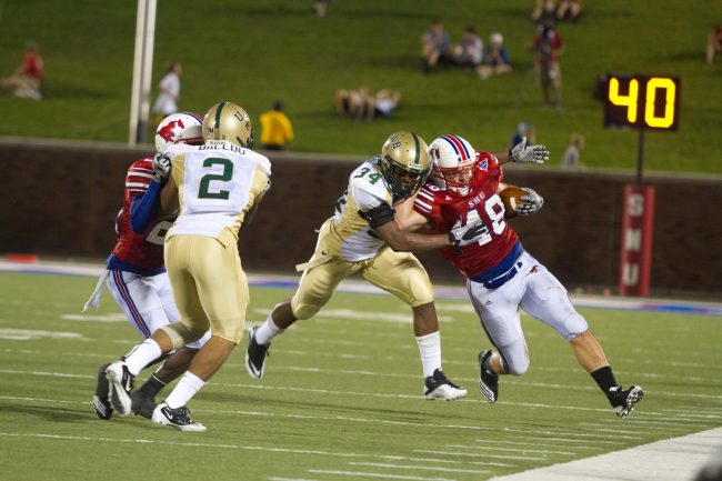 Junior Running Back Zach Line carries the ball for a completion during play against UAB on November 6th.
