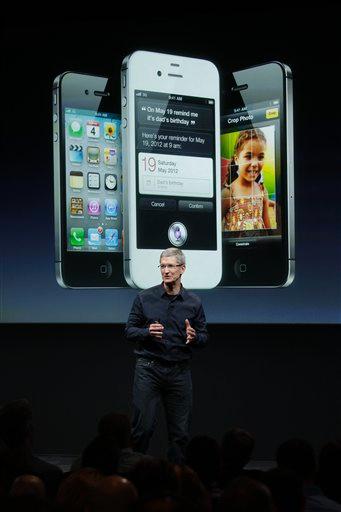 Apple CEO Tim Cook talks about the iPhone 4S during an announcement at Apple headquarters in Cupertino, Calif., Tuesday, Oct. 4, 2011. 
