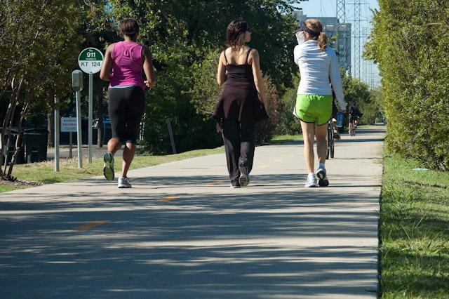 Walkers and joggers enjoying a beautiful afternoon on the Katy Trail.