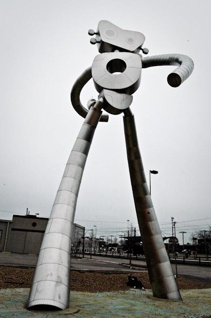 “The Traveling Man” statue is located at the Deep Ellum DART station.