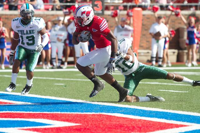 Junior wide receiver Darius Johnson scores a touchdown during Saturday afternoon’s Homecoming game against Tulane. Johnson made seven catches that day for a total of 135 yards. The Mustangs won 45-24.