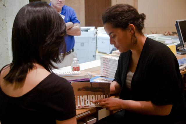 Historian and recipient of SMU’s William P. Clements Prize for the Best Non-Fiction Book on Southwestern America Kelly Lytle Hernandez  signs copies of her book, “MIGRA! A History of the U.S. Border Patrol” after delivering a lecture Tuesday evening in the DeGolyer Library.