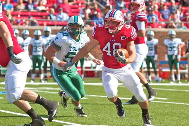 Junior runningback Zach Line carries the ball for a touchdown against Tulane Oct. 5 at Ford Stadium.