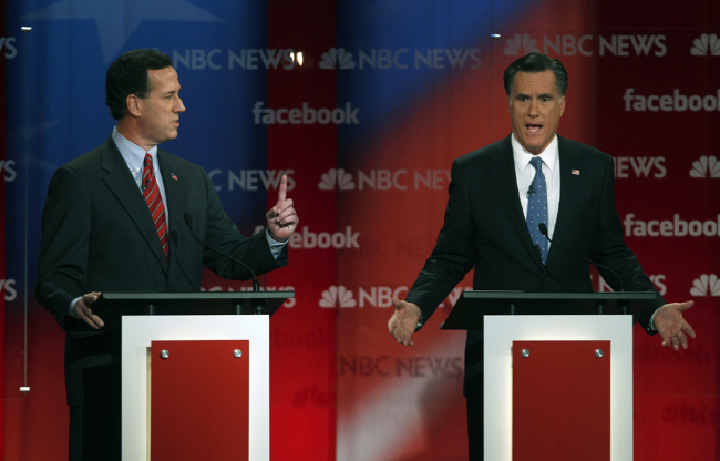 Sen. Rick Santorum, left, and former Massachusetts Gov. Mitt Romney spar during a debate.