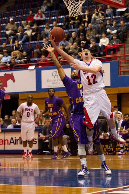 SMU guard Jeremiah Samarrippas attempts a layup during play against ECU in last year’s game. SMU will take on 