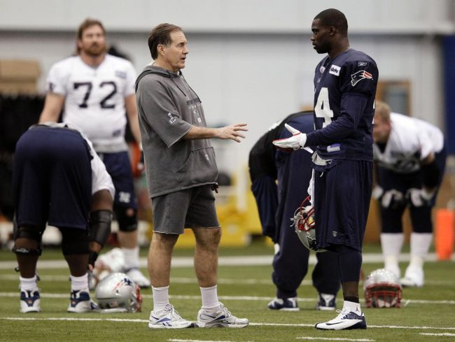 New England Patriots head coach Bill Belichick talks with strong safety James Ihedigbo during practice on Thursday. The Patriots are scheduled to face the New York Giants Super Bowl XLVI on Feb. 5. 