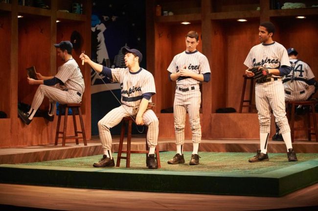 “Take Me Out” actors sport the Empires baseball team uniforms in one of the play’s beginning scenes. Actors from left to right, Tony Martin as Skipper, Andrews W. Cope as Shane Mungett, Kevin Moore as Kippy Sunderstorm and Lloyd Harvery as Darren Lemming.