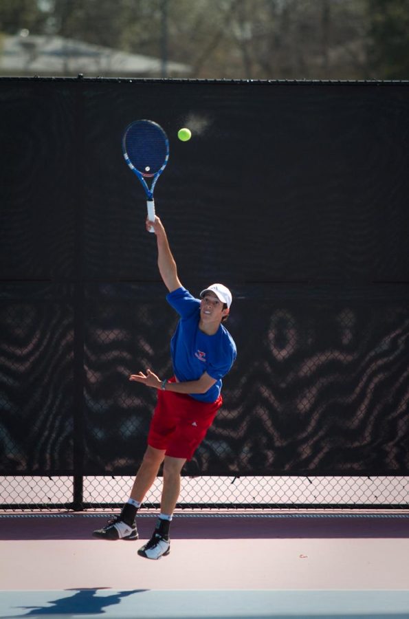 Senior Robert Sajovich serves the ball during a double’s march against Tulsa at Turpin Stadium March 3, 2011. Due to construction, Turpin has been closed all semester. Tennis matches have been held around the DFW area.