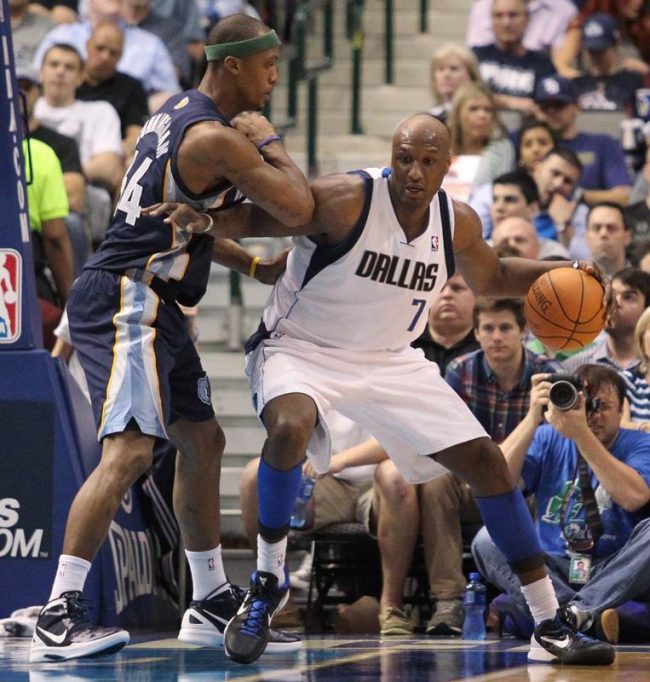 Dallas Mavericks forward Lamar Odom works against Memphis Grizzlies forward Dante Cunningham during the second half of an NBA basketball game in Dallas on Wednesday, April 4,. Odom was recently moved to the Mavs’ inactive list, marking his departure from the Dallas basketball team.