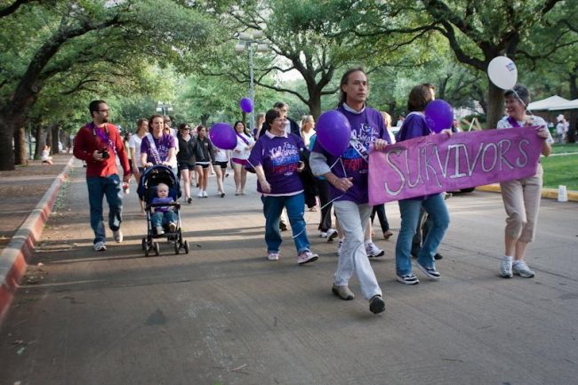 Cancer survivors from the April 15, 2011 Relay for Life walk around the boulevard to kick off the event in solidarity with survivors the world round.