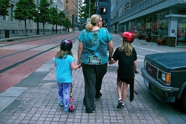 Shannon Montgomery and daughters Kensington, 10, and Tate, 7, experience a full, but unusual life downtown. 
