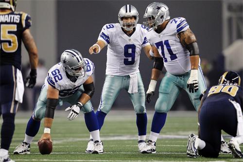 Cowboys Tony Romo (9) , Nate Livings (71) and David Arkin (62) take position against the Rams Aug. 25.