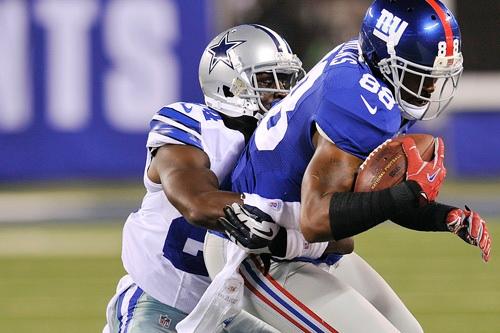 Rookie Morris Claiborne makes a tackle against the Giants Sept. 5.