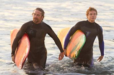Gerard Butler and Jonny Weston star in the surfing film ‘Chasing Mavericks.’ 