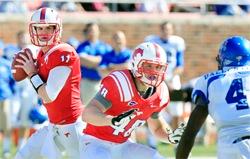 SMU quarterback Garrett Gilbert ran for two touchdowns and passed one touchdown pass Saturday against the Memphis Tigers. 