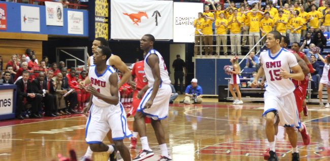 Ryan Manuel (15) and the SMU men’s team playing defense against the Houston Cougars on  Feb. 2.
