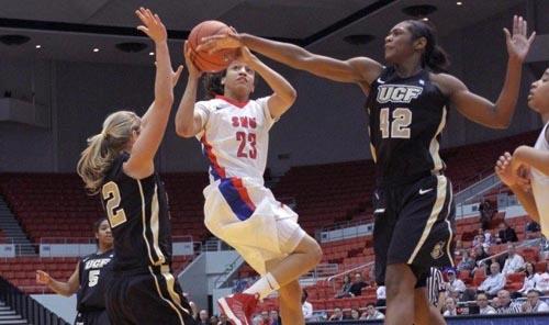 Keena Mays shooting a contested jumper against UCF on Jan. 13