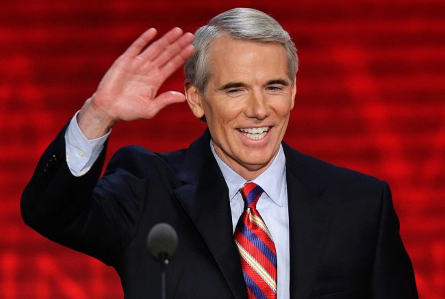 In this Aug. 29, 2012, file photo, Sen. Rob Portman (R-Ohio) waves to the delegates during the Republican National Convention in Tampa, Fla. Portman said Thursday, March 14, 2013 that he now supports gay marriage and says his reversal on the issue began when he learned one of his sons is gay.